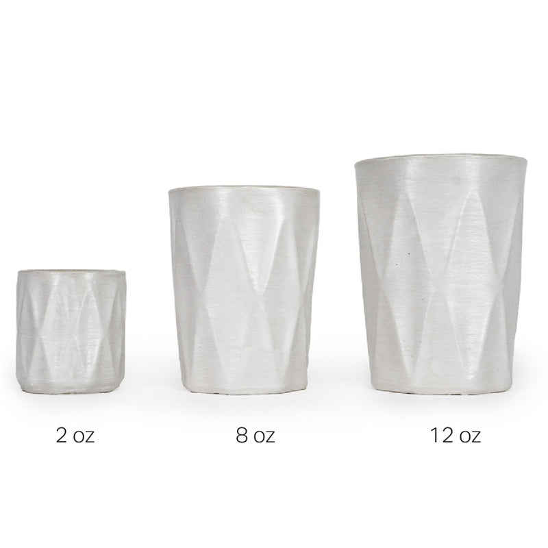 Three textured 3D printed ceramic drinking cups with large diamond patters with different volumes, 2oz, 8oz, and 12oz