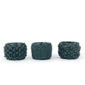 Three textured 3D printed ceramic cactus planters with different design patterns: loop, twist, and petal