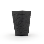 Matte black textured 3D ceramic printed chalice planter, with a bloom pattern on a white background