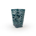 Storm colored textured 3D ceramic printed chalice planter, with a bloom pattern on a white background