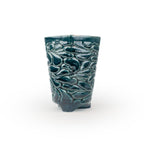 Storm colored textured 3D ceramic printed chalice planter, with a bloom pattern on a white background
