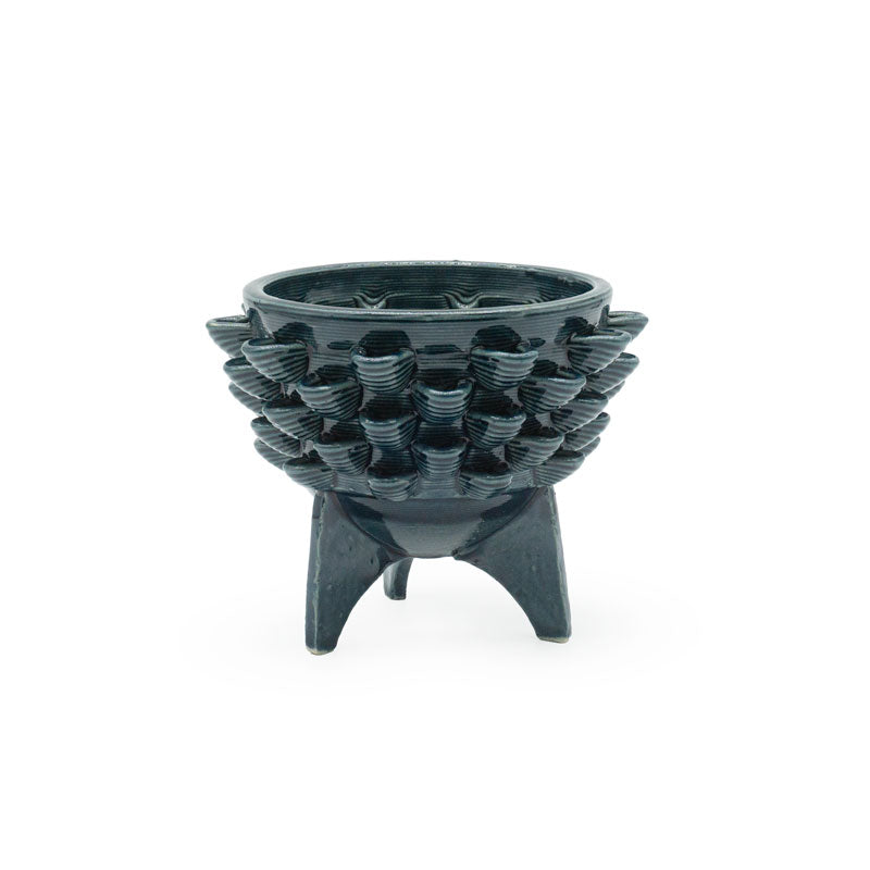 Storm colored 3D ceramic printed cactus planter with a rocket petal pattern on a white background