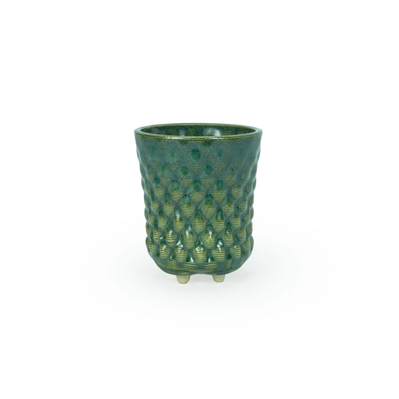 A textured green 3D printed ceramic dot patterned chalice planters on a white background