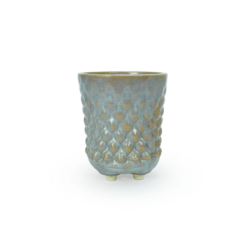 A textured light blue and gold 3D printed ceramic dot patterned chalice planters on a white background