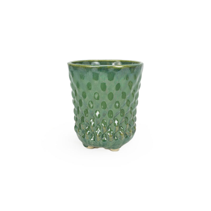 A textured green 3D printed ceramic dot patterned chalice planters on a white background