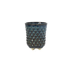 A textured blue 3D printed ceramic dot patterned chalice planters on a white background
