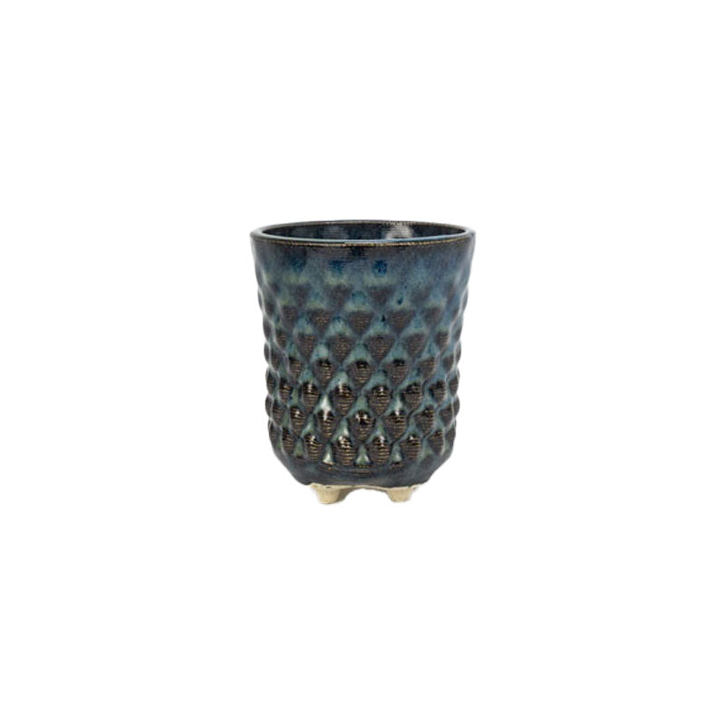 A textured blue 3D printed ceramic dot patterned chalice planters on a white background
