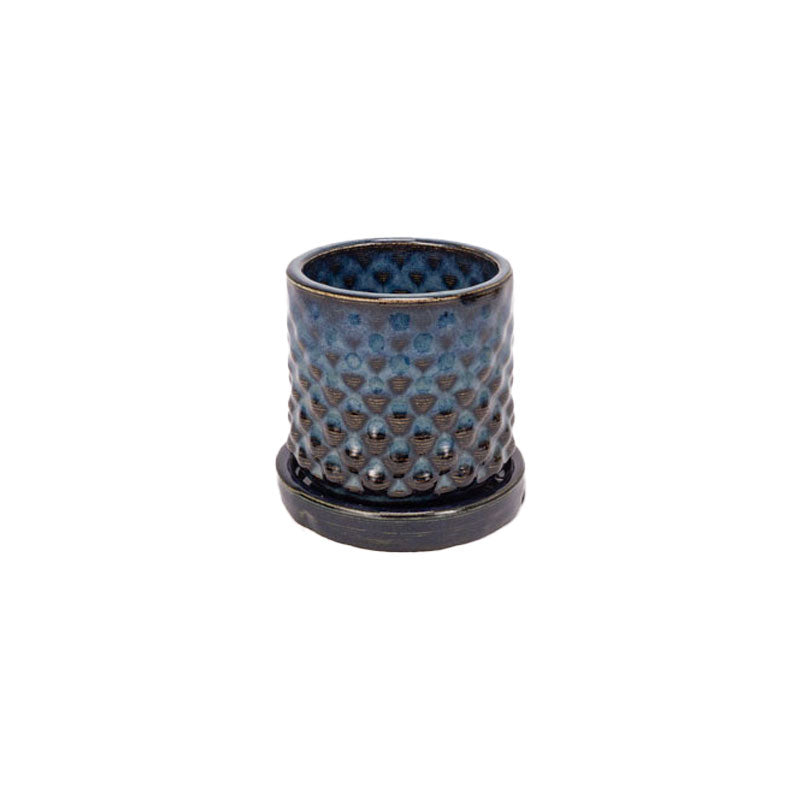 Sapphire float colored 3D printed ceramic planter with a dot pattern, with a tray on a white background