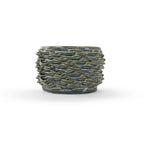 Blue rutile 3D printed ceramic cactus planter or tea light holder with a twist pattern, on a white background