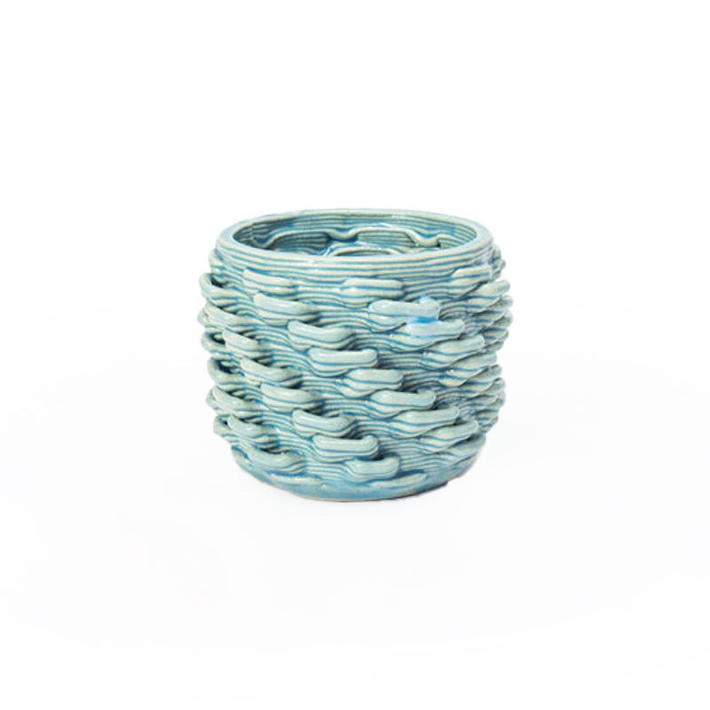 Lagoon 3D printed ceramic cactus planter or tea light holder with a twist pattern, on a white background