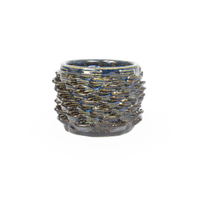 Sapphire float colored 3D printed ceramic cactus planter or tea light holder with a twist pattern, on a white background