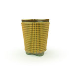 A textured iron lustre chalice 3D printed ceramic planter with a micro scallop pattern on a white background