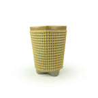 A textured gold chalice 3D printed ceramic planter with a micro scallop pattern on a white background