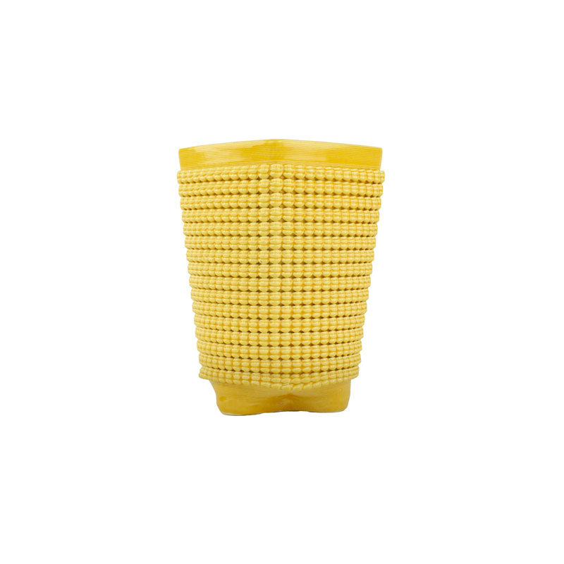 A textured marigold chalice 3D printed ceramic planter with a micro scallop pattern on a white background