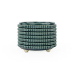 Textured 3D printed ceramic storm colored planter, on a white background