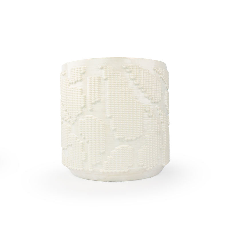 Snow colored 3D printed ceramic planter with pixel paisley pattern on a white background