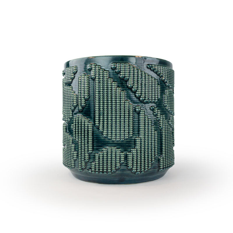 Storm colored 3D printed ceramic planter with pixel paisley pattern on a white background