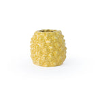Marigold colored 3D printed ceramic planter with a pineapple pattern, on a white background