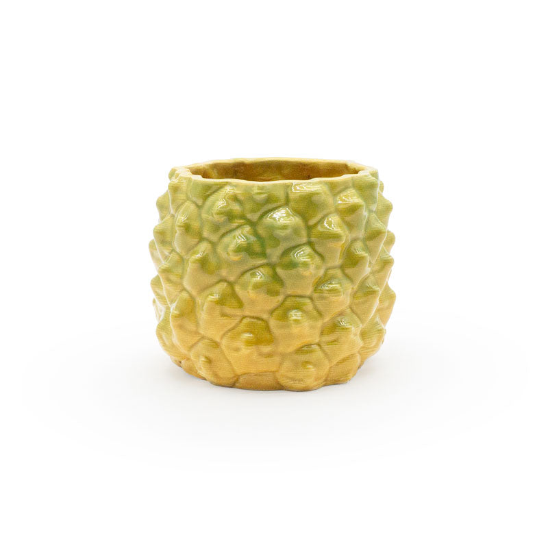 Marigold colored 3D printed ceramic planter with a pineapple pattern, on a white background