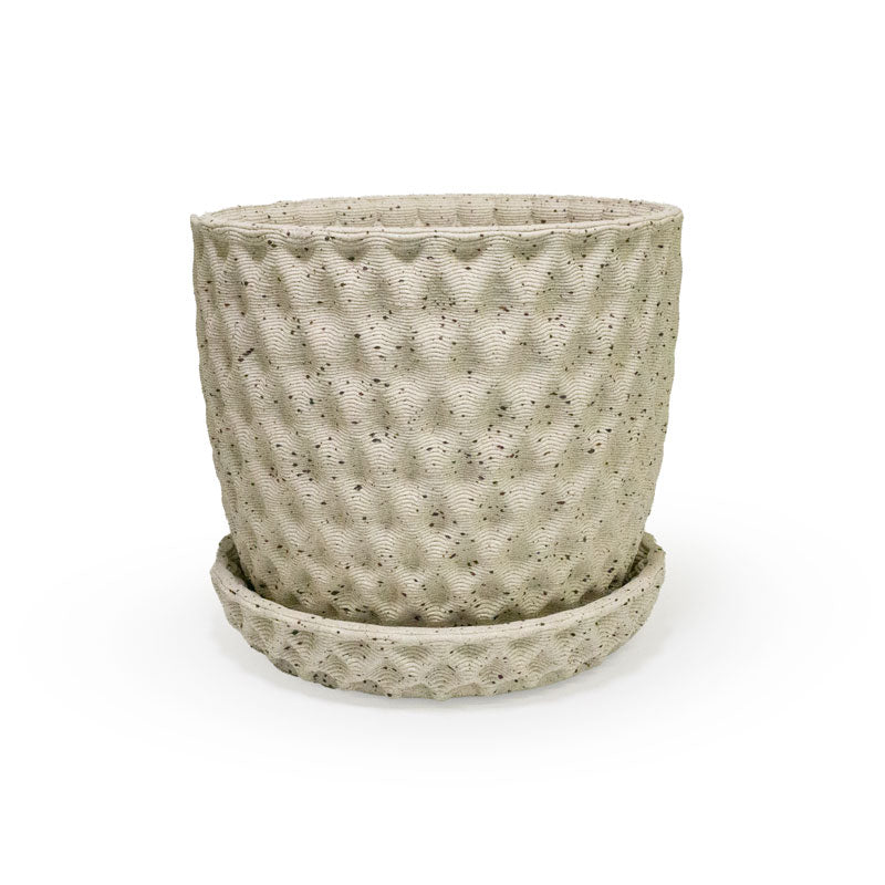 a close up of a 3D ceramic printed planter with a diamond pattern and speckles, with a tray
