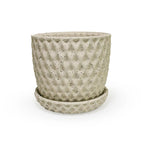 a close up of a 3D ceramic printed planter with a diamond pattern and speckles, with a tray