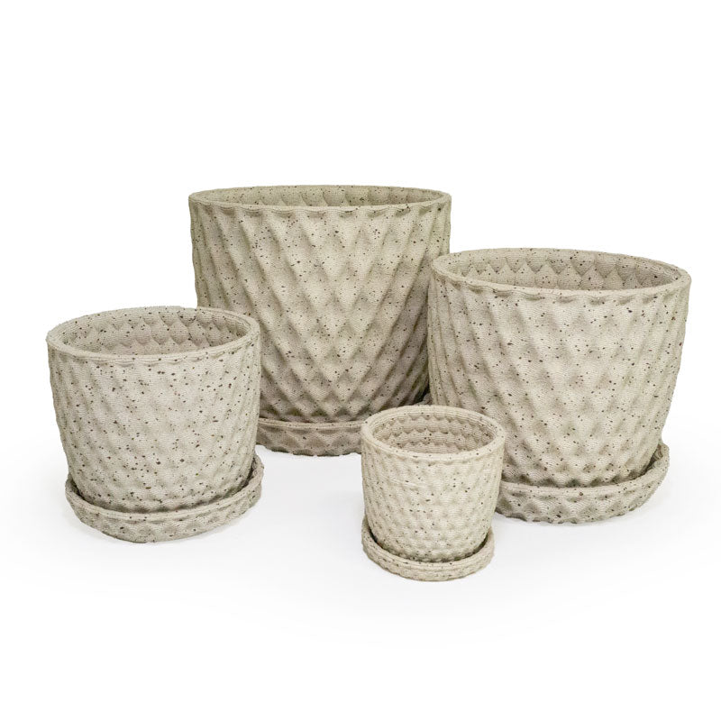 four 3D ceramic printed planters with a diamond pattern and speckles, all with a tray under the planters