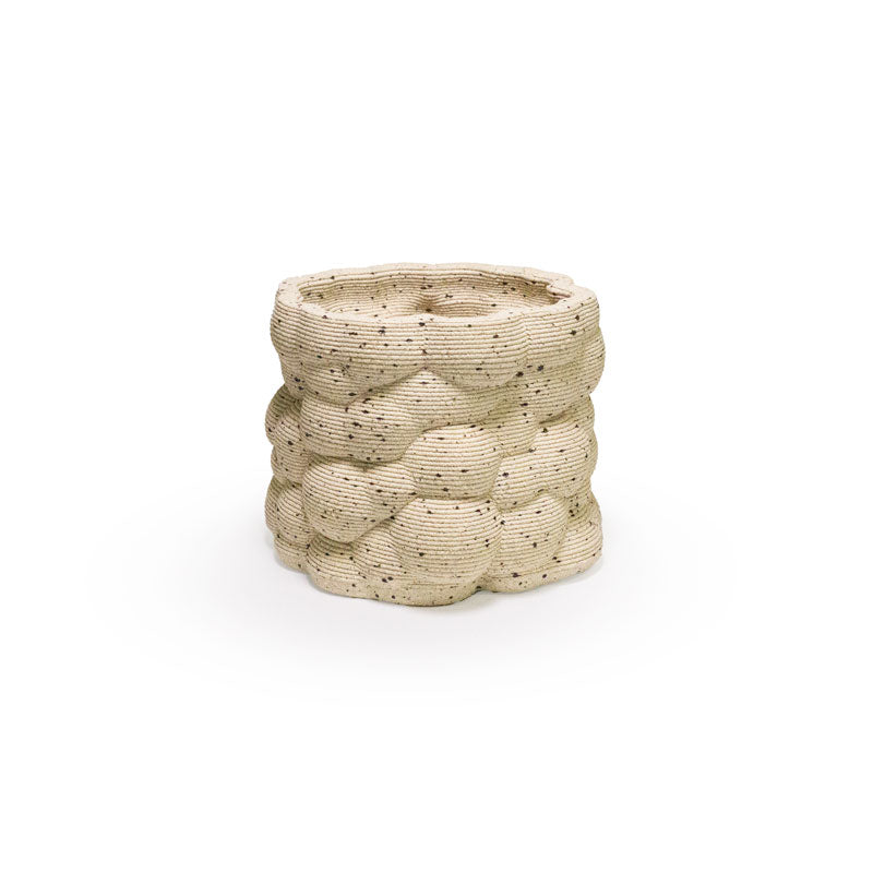 3D printed ceramic planter with a bubble pattern on a white background