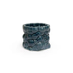 3D printed ceramic planter with a storm blue bubble pattern on a white background