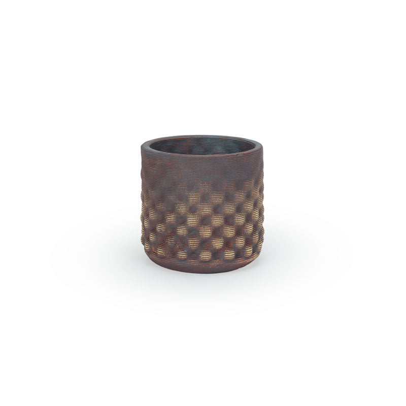Red iron oxide colored 3D printed ceramic planter with a dot pattern, on a white background