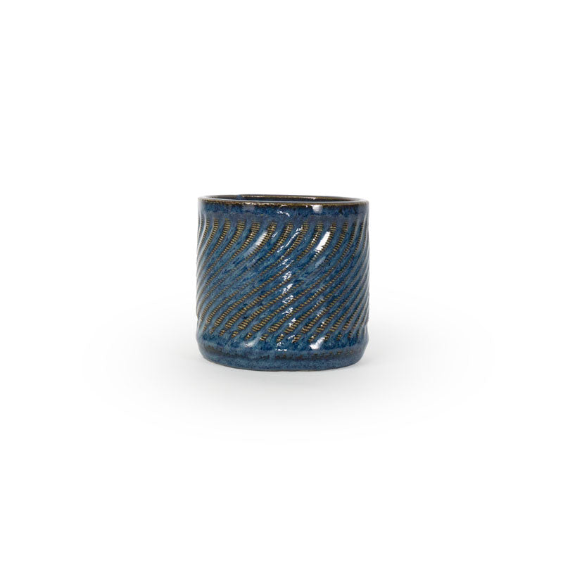 Sapphire float colored 3D printed ceramic planter with a swirl pattern on a white background