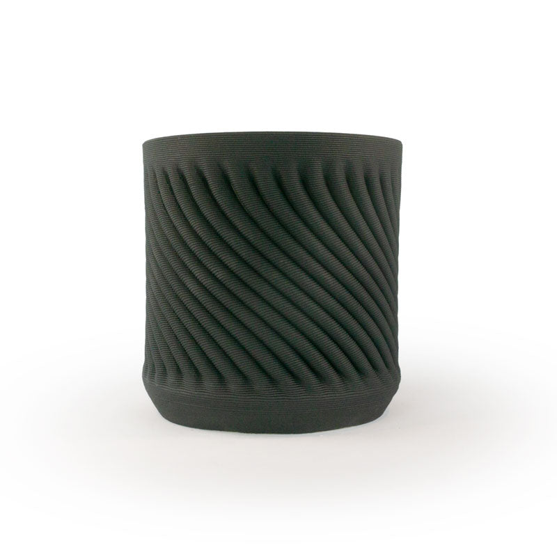 Matte black colored 3D printed ceramic planter with a swirl pattern on a white background