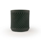 Matte black colored 3D printed ceramic planter with a swirl pattern on a white background