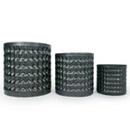 Three textured metallic black 3D printed ceramic planters with a waffle pattern, on a white background