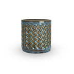 Blue rutile colored 3D printed ceramic planter with a zig zag pattern, on a white background