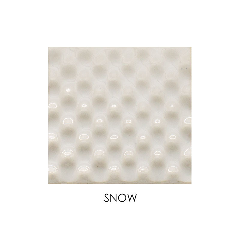 Textured white square with 'SNOW' label on a white background