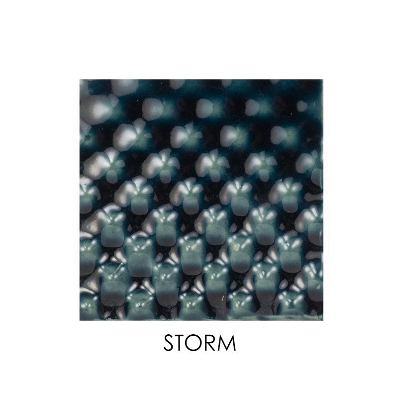 Square ceramic tile with a textured surface and 'STORM' label on a white background
