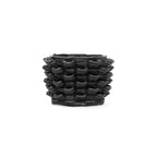 A black 3D printed ceramic cactus planter with a petal loop pattern