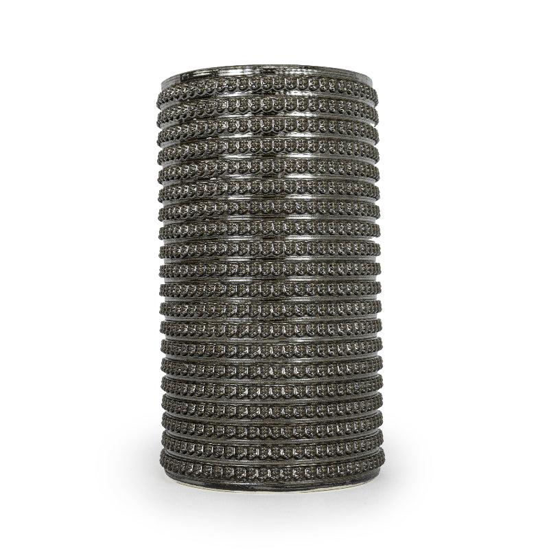 Black 3D printed ceramic vase with a micro scallop pattern, on a white background