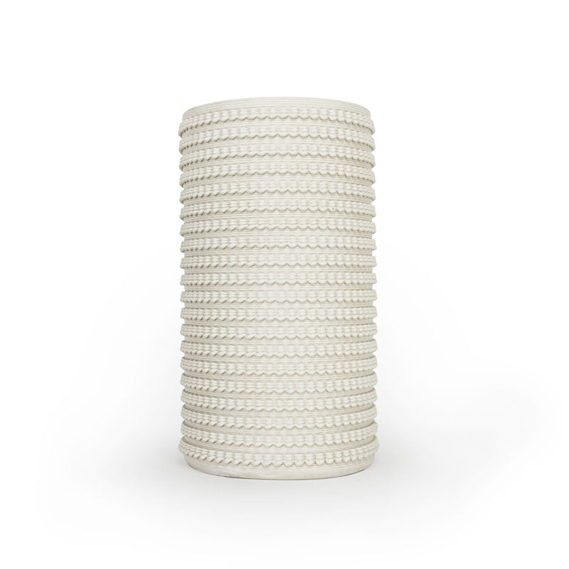 Satin white 3D printed ceramic vase with a micro scallop pattern, on a white background