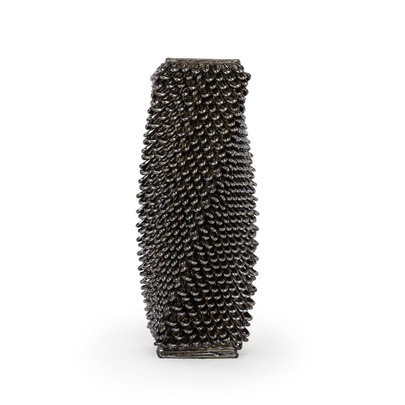 Palladium colored 3D printed ceramic tall vase with a loopy square twist pattern, on a white background