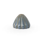 Blue rutile colored 3D printed ceramic bud vase with an urchin pattern, on a white background