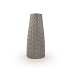 Tall light sepia textured 3D printed ceramic vase with a zig zag taper, on a white background